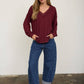 RAW EDGE V-NECK LONG SLEEVE TEXTURED KNIT TOP