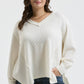 PLUS V NECK ASYMMETRICAL HEM LONG SLEEVE KNIT TOP