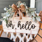 Oh hello, hand painted cow print door hanger