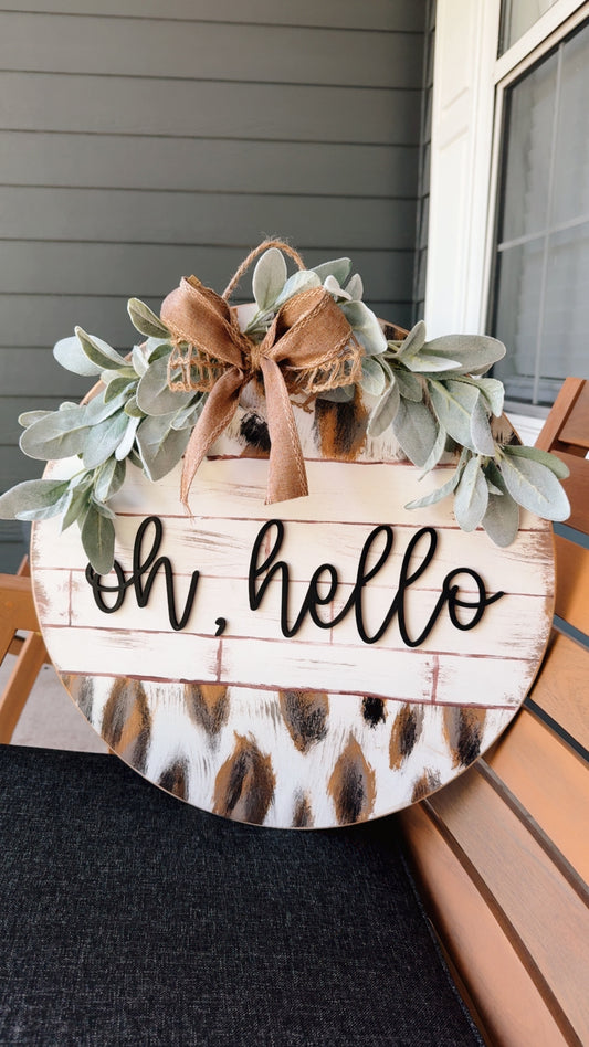 Oh hello, hand painted cow print door hanger