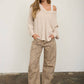 RAW EDGE V-NECK LONG SLEEVE TEXTURED KNIT TOP