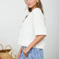 RAW EDGE HENLEY SHORT SLEEVE WAFFLE KNIT TOP