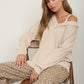 RAW EDGE V-NECK LONG SLEEVE TEXTURED KNIT TOP