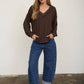 RAW EDGE V-NECK LONG SLEEVE TEXTURED KNIT TOP