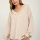 RAW EDGE V-NECK LONG SLEEVE TEXTURED KNIT TOP