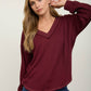 RAW EDGE V-NECK LONG SLEEVE TEXTURED KNIT TOP
