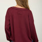 RAW EDGE V-NECK LONG SLEEVE TEXTURED KNIT TOP
